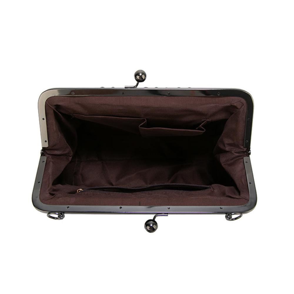 Vintage kiss lock handbag