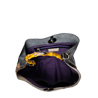 Claire Jaguar and black leather bag for women