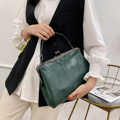 Vintage kiss lock handbag